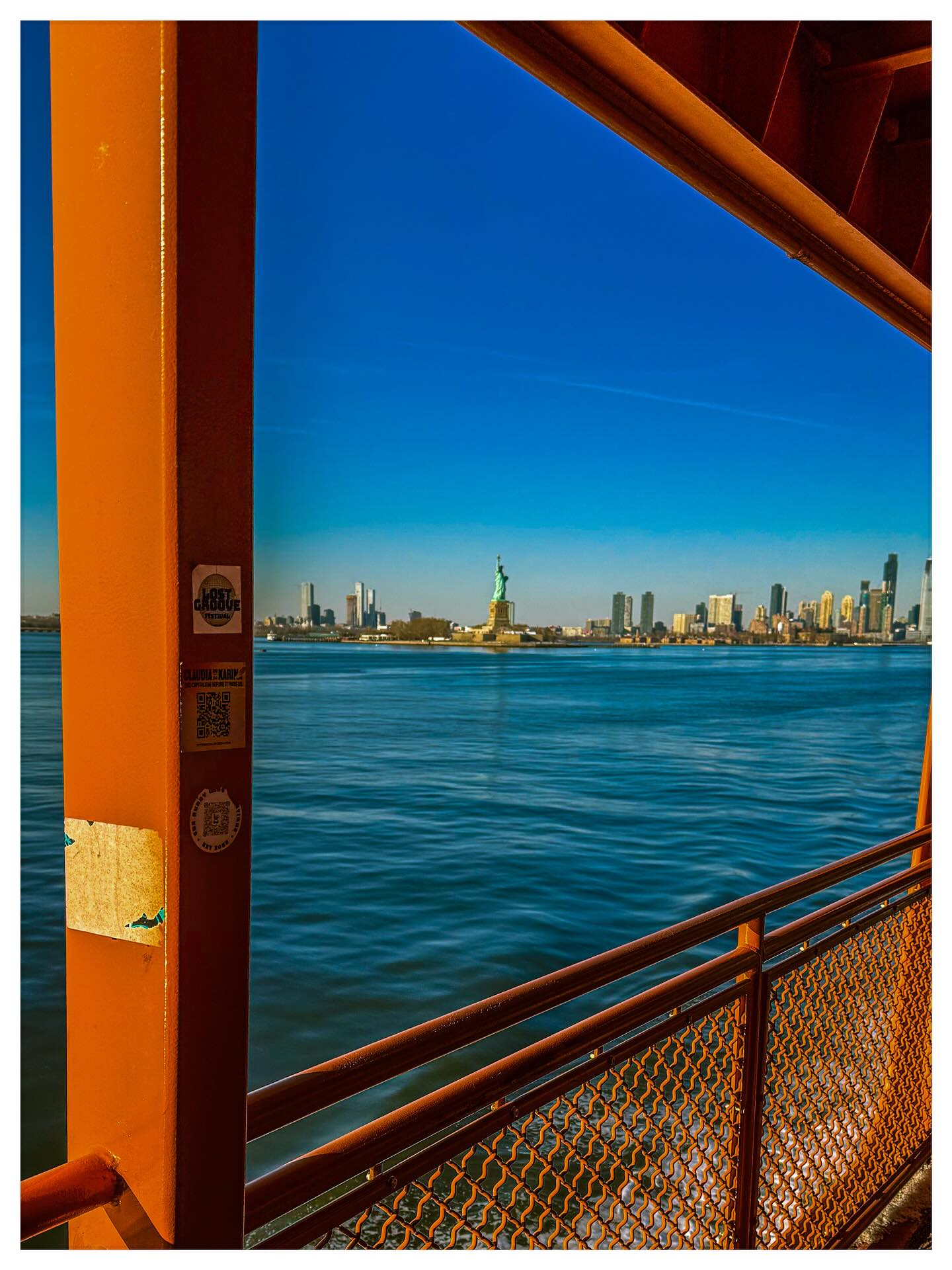 Liberty Through the Ferry — New York Harbor